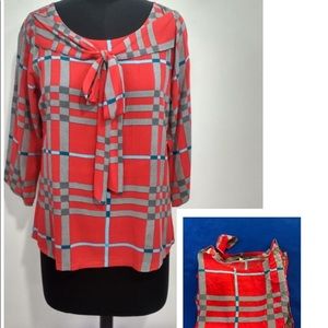 Blouse in red pleated design